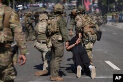 Рейды в Лос-Анжелесе. 7 июня 2025, фото AP