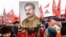 RUSSIA -- Russian Communist party supporters hold portraits of Soviet leader Josef Stalin as they gather to mark the Stalin's 139th birthday on the Red Square, in Moscow, December 21, 2018