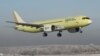 RUSSIA -- The M-21-310 passenger plane with Russian-produced PD-14 engines is seen during its test flight in Irkutsk, December 15, 2020