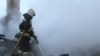 Tajikistan/Russia -- Russian fireman battle with a fire at house near Moscow,while five tajik migrant death, 5 January 2014