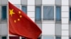 The Chinese flag is pictured in front of the building of the Chinese embassy in Berlin on April 22, 2024.
